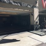 Wide-angle shot of W hotel entrance with glass facade