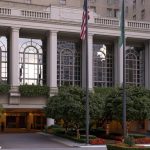 Wide view of Fairmont Olympic hotel entrance with canopy