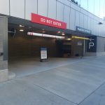 Wide-angle view of building 3314 entrance with security gates