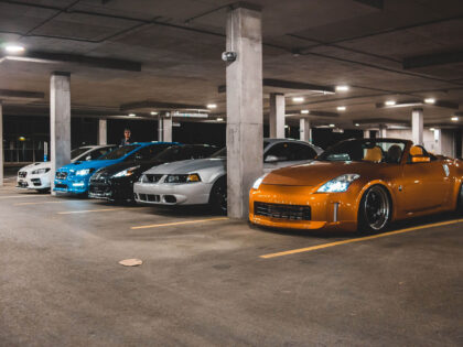 An image of cars parked in a parking garage.